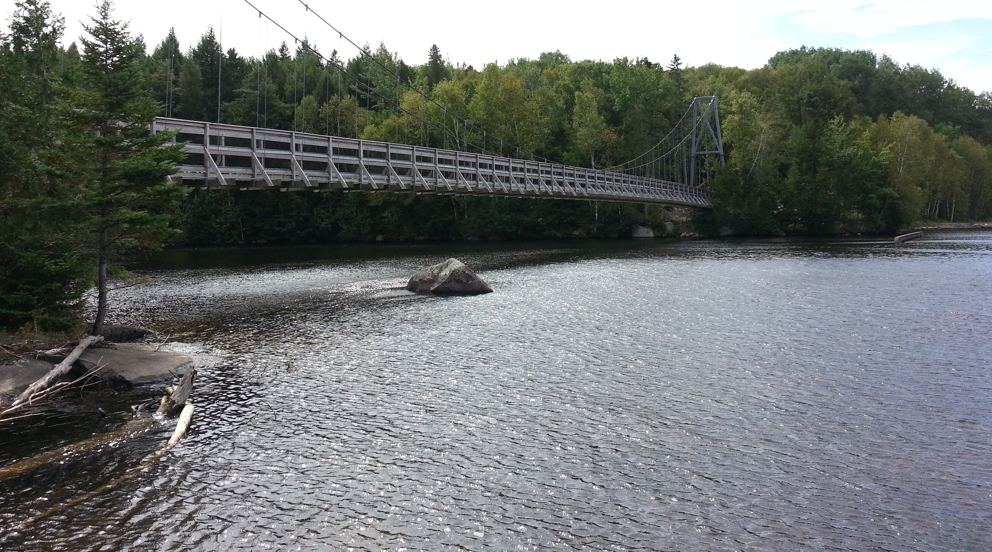 Suspension bridge over the mouth of Shogomoc Stream