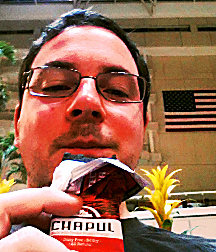 Eating a Chapul Aztec bar in MCO